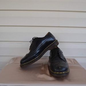 Men's wingtip Dr. Martens.